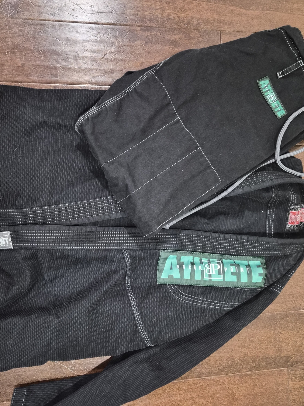 Black Athlete Patch Gi Jacket And Pants with Green Logo